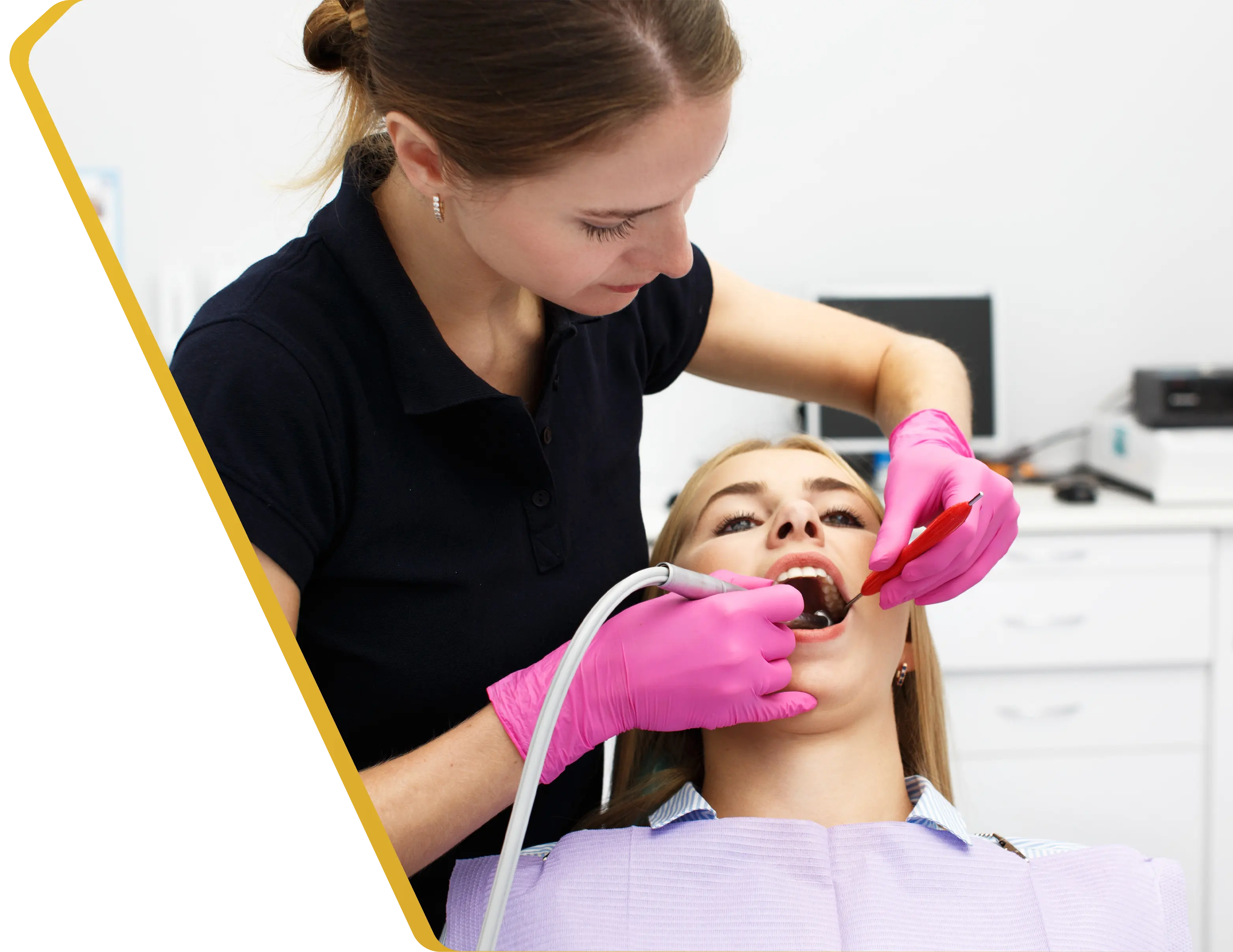 A patient receiving a gentle dental exam and cleaning at Dentistry at Millennium Park in Chicago