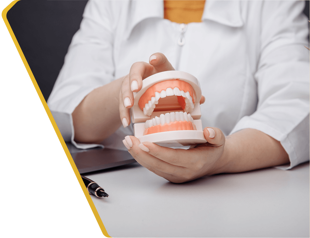 A patient's confident smile after full or partial dentures at Dentistry at Millennium Park in Chicago