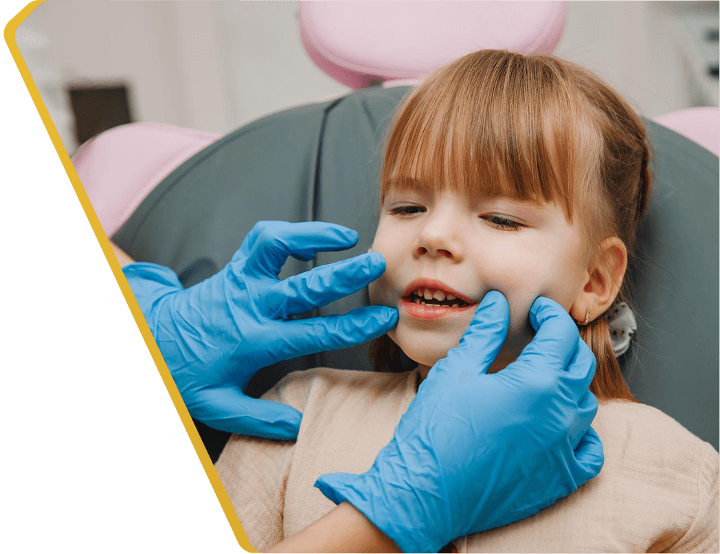 A smiling child at a gentle dental cleaning at Dentistry at Millennium Park in Chicago
