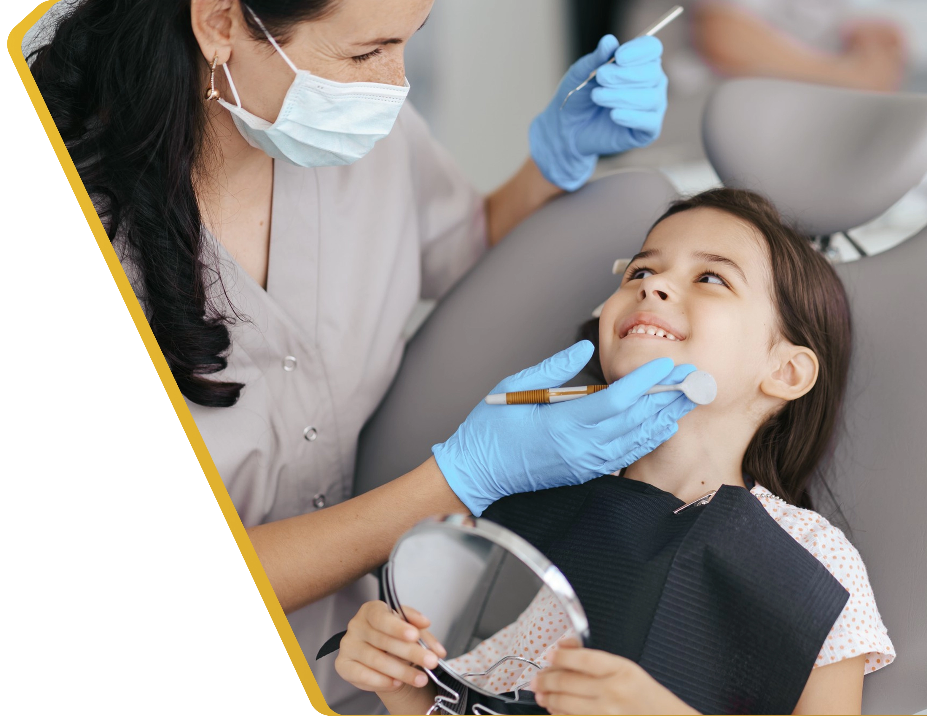 A child smiling after a gentle fluoride treatment at Dentistry at Millennium Park in Chicago