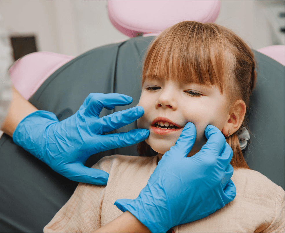 A smiling child at a gentle dental cleaning at Dentistry at Millennium Park in Chicago