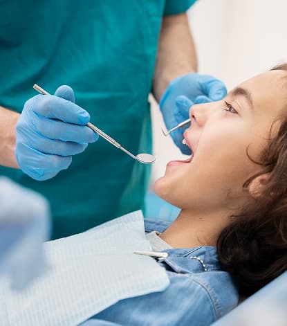 Patient receiving cosmetic dental care