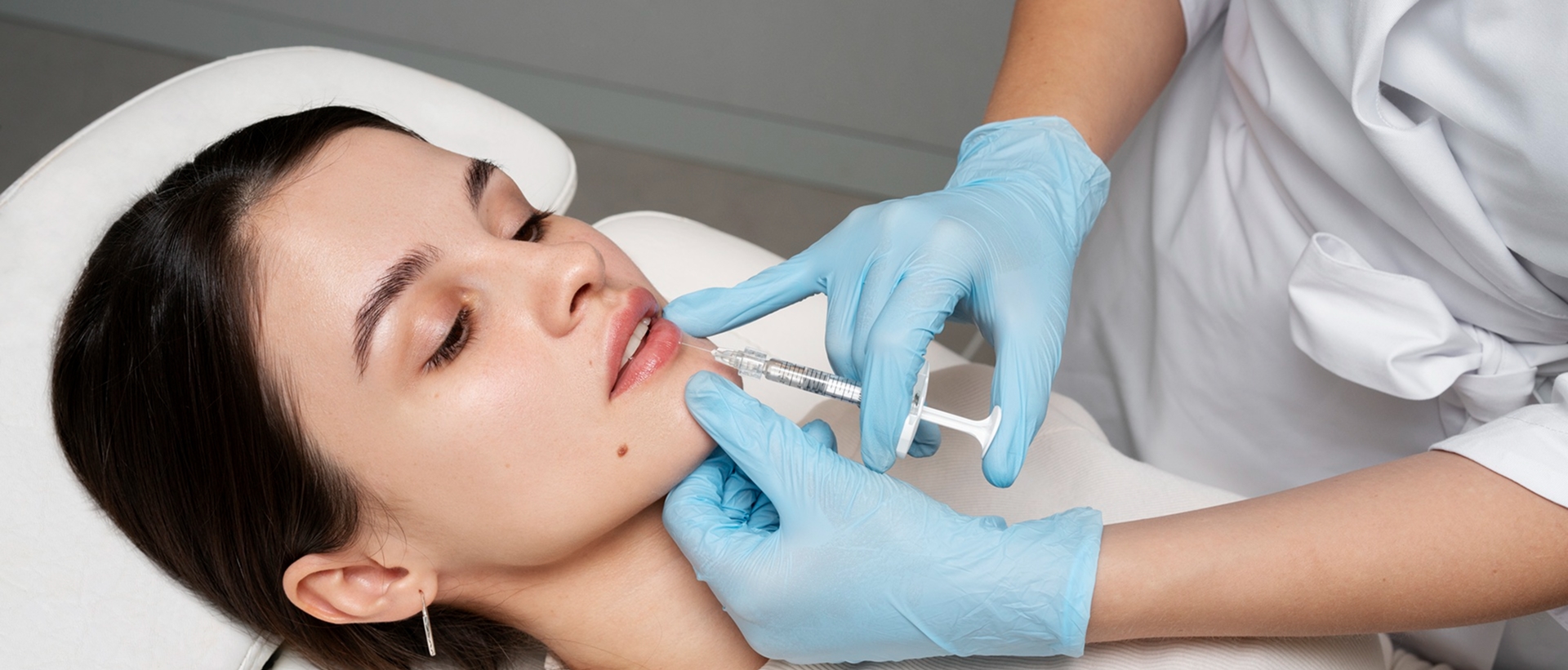 A relaxed patient during a facial aesthetic treatment at Dentistry at Millennium Park