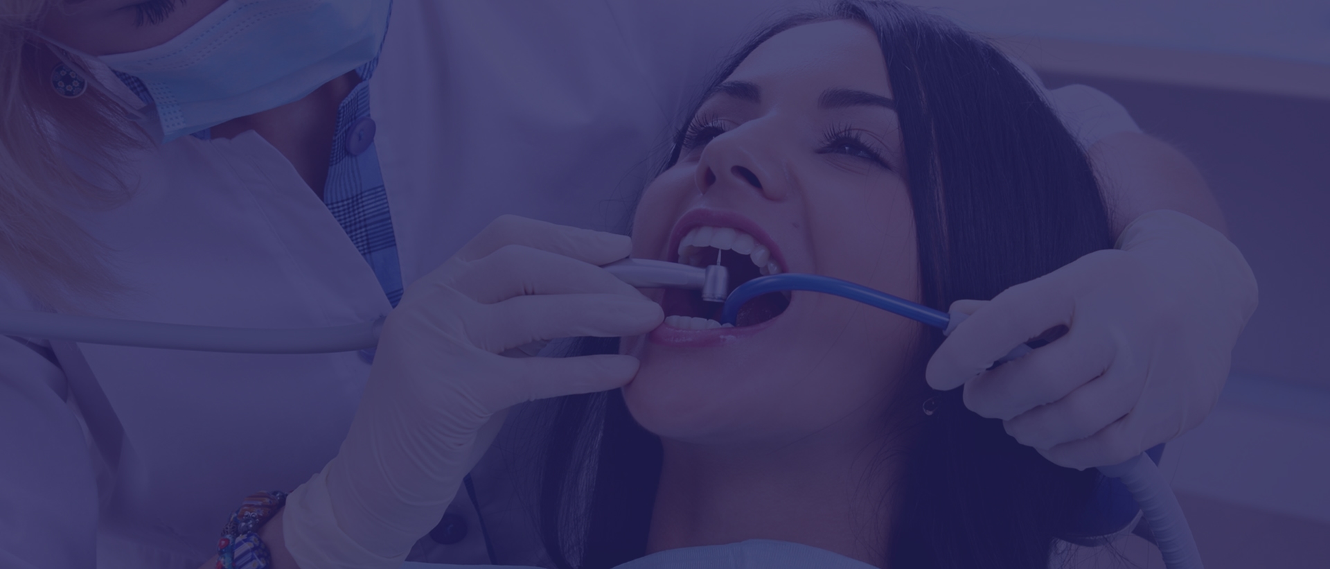 A patient receiving a preventive dental checkup at Dentistry at Millennium Park