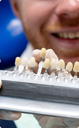A tooth-colored porcelain dental crown