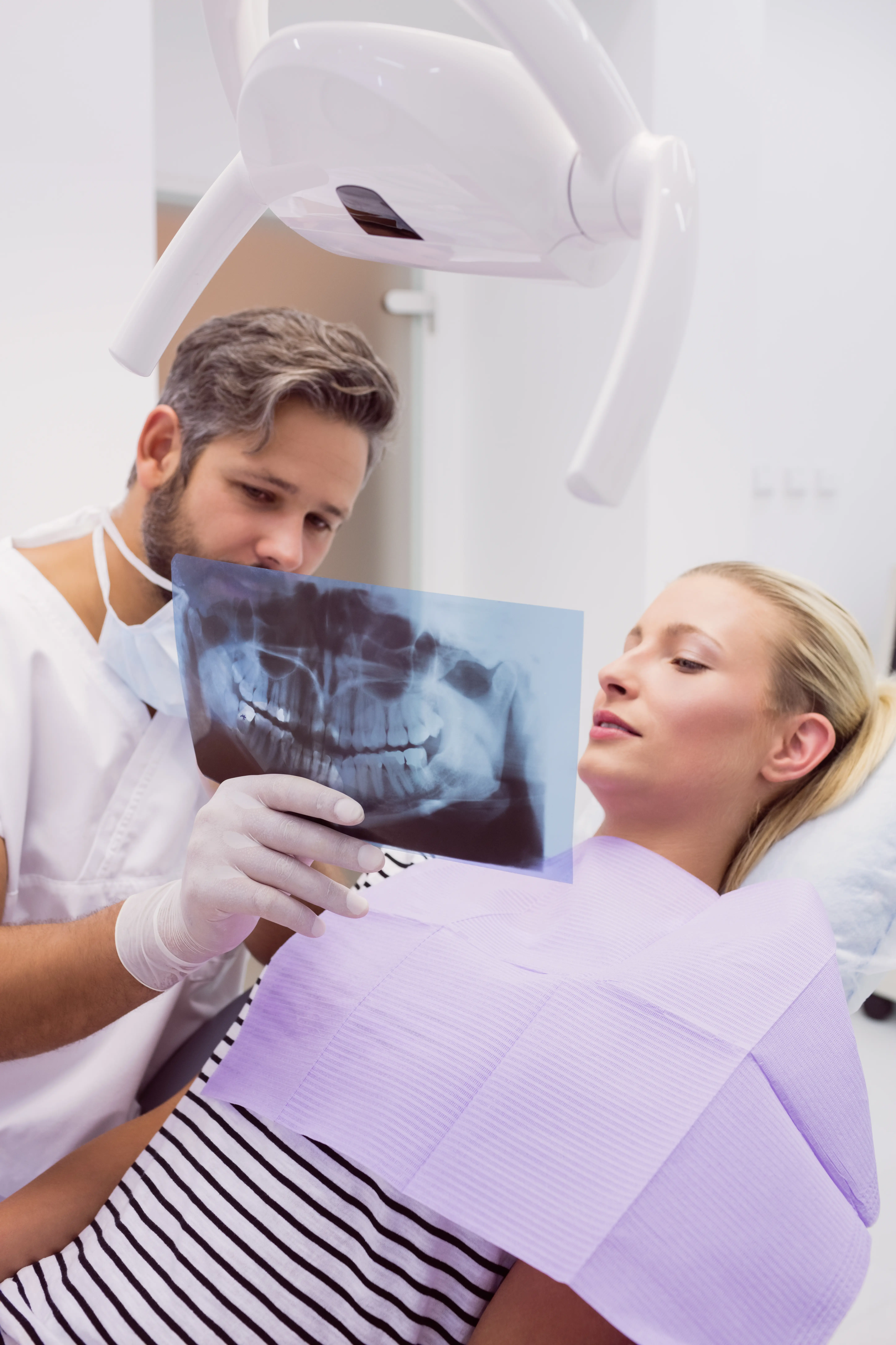 A detailed digital dental X-ray image on screen