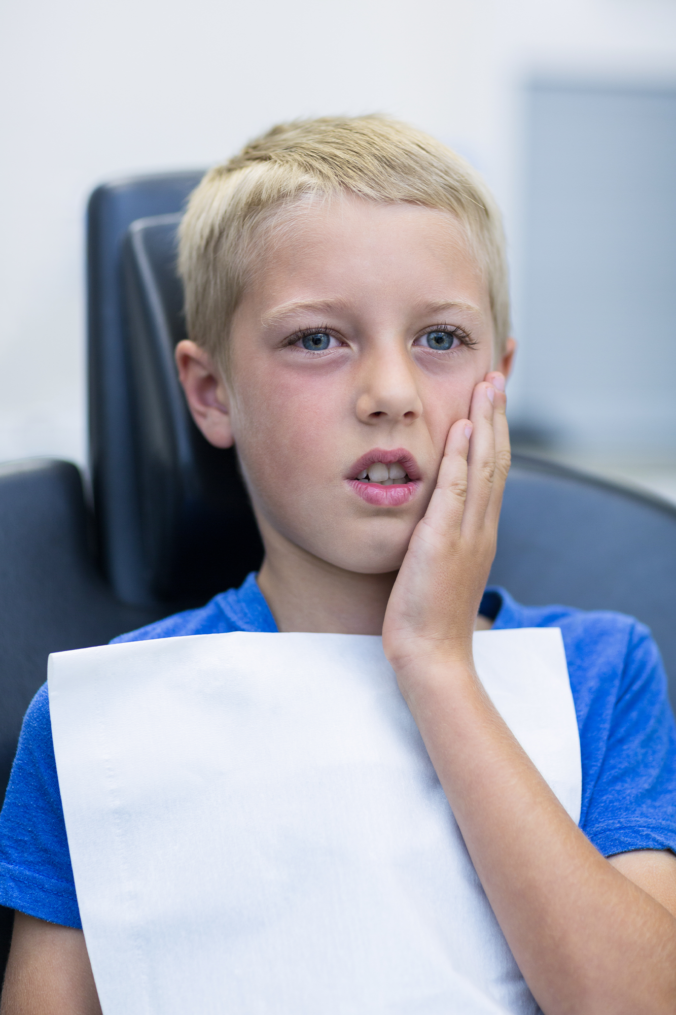 A natural, tooth-colored filling on a child's tooth